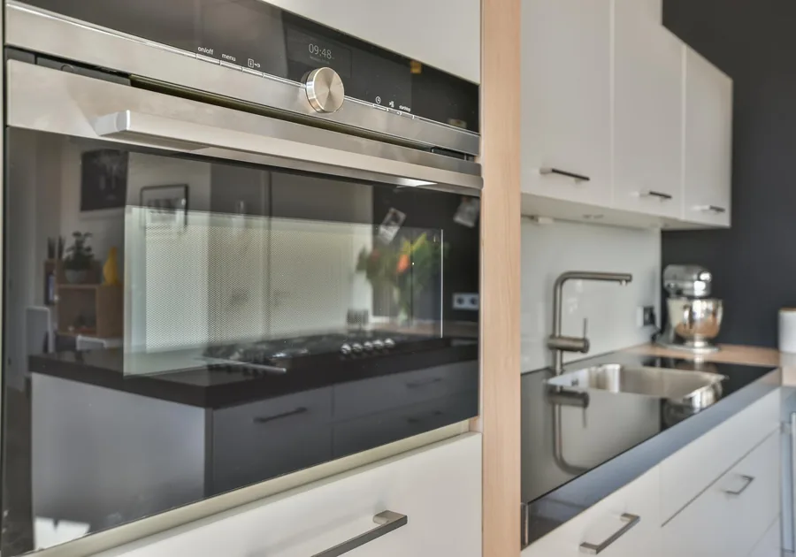 Built-in microwave set into kitchen cabinetry